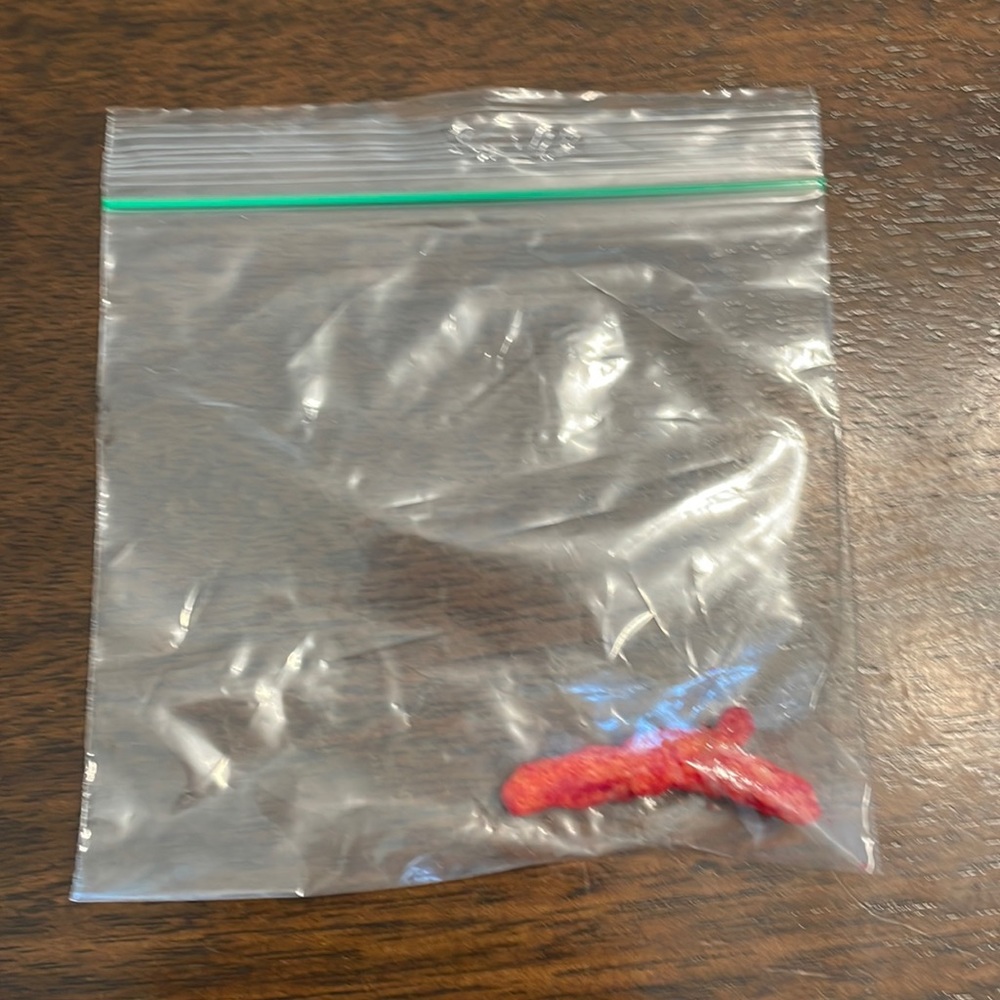 shot gun shaped hot cheeto